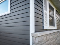 photo_03_Steel-Siding-Case-Study_Sydney-OH_Board-and-Batten_Natural-Slate-Color-1130408_FF-Color-Corrected_0917